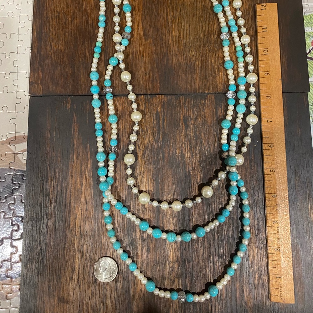Layered long beaded necklace